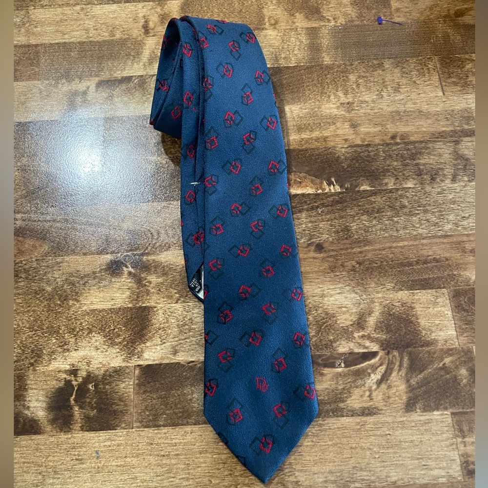 Christian Dior allover print Thin Tie. 95% polyester 5%Silk Made in the USA.
